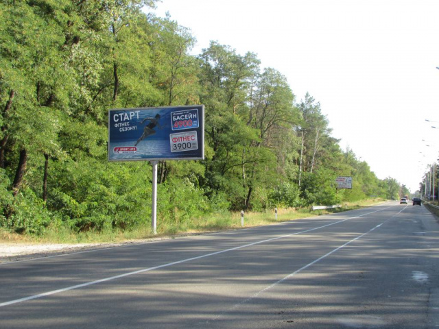 Білборд/Щит, Київ, Мінське шосе (Р02), міська смуга, рух в напрямку Києва, ліворуч