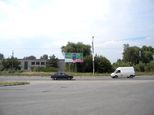 Білборд/Щит, Ізюм, траса, біля АЗС вул. Шмідта