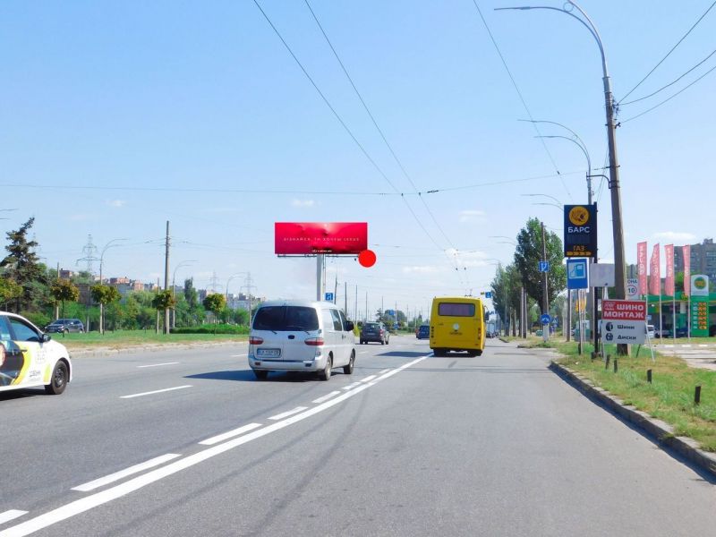 Суперсайт/Мегаборд, Киев, Шухевича Романа пр-т, на перехресті до Північного мосту, навпроти супермаркету "Novus"