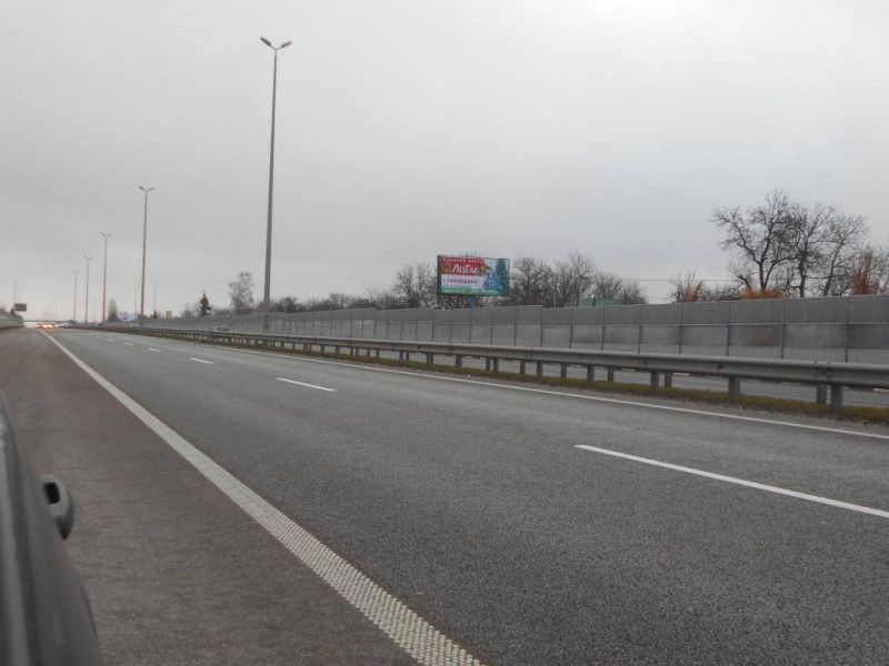 Билборд/Щит, Трассы, с. Любимівка, траса М-06 "Київ-Чоп" (Житомир), км 33+680 ліво, за 250м до садового центру "Лізгард"