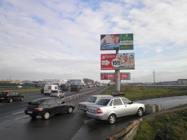 Білборд/Щит, Київ, вул. В.Кільцева, виїзд з ЖК Щасливий (Софіївська Борщагівка) / NOVUS/ АЗС "UPG - в напр. Одеської пл. (нижній)