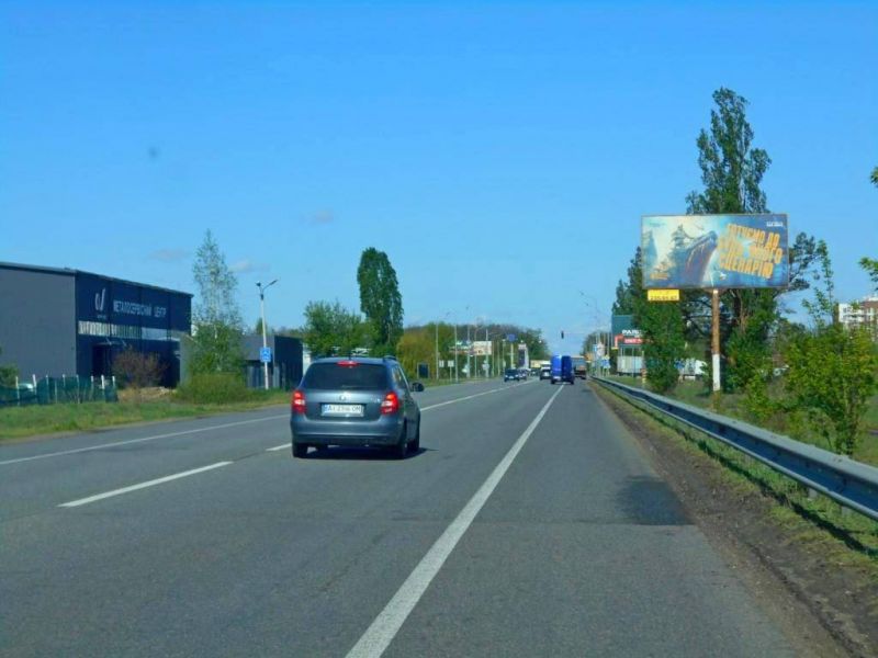 Білборд/Щит, Буча, м. Буча, траса М-07 "Київ-Ковель", км 31+400 право, через 450м після повороту на автошлях Т1001 та смт. Ворзель, за 550м до АЗС БРСМ Нафта, за 700м до ЖК "Форест Ленд" // з Києва