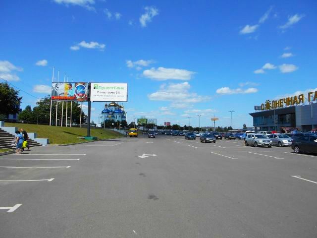 Білборд/Щит, Кривий Ріг, 30 років Перемоги пл., 1, стоянка Сонячна галерея, с\м "ОКЕЙ" , лівий