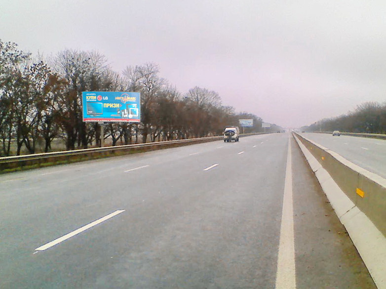 Білборд/Щит, Траси, Одеса-Київ  (453 + 160км). За Клеверним мостом з Одеси,  к с.Алтестово, складський комплекс