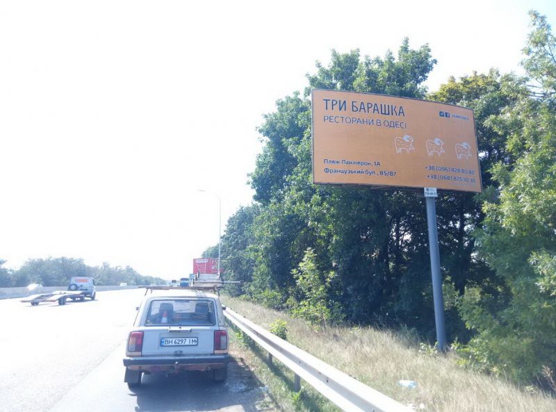 Білборд/Щит, Траси, Київ-Одеса (452+870). До Клеверного моста з Києва , складський комплекс, АЗС Sokar