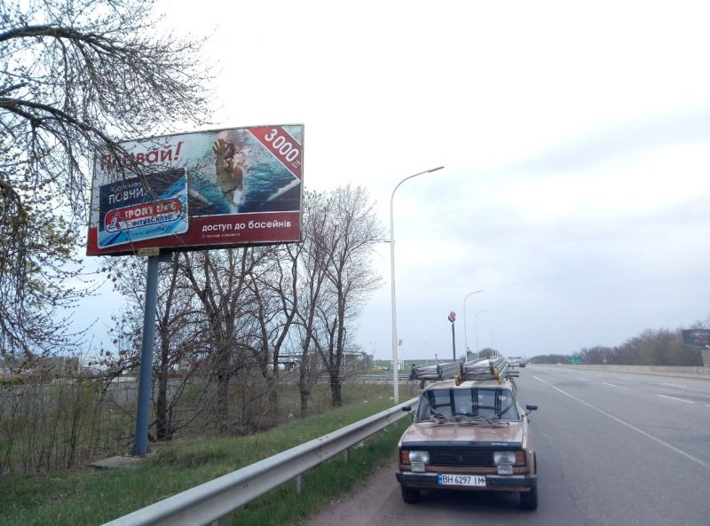 Білборд/Щит, Траси, Одеса-Київ (452+870км).За Клеверным мостом з Одеси, складський комплекс, перед АЗС Sokar