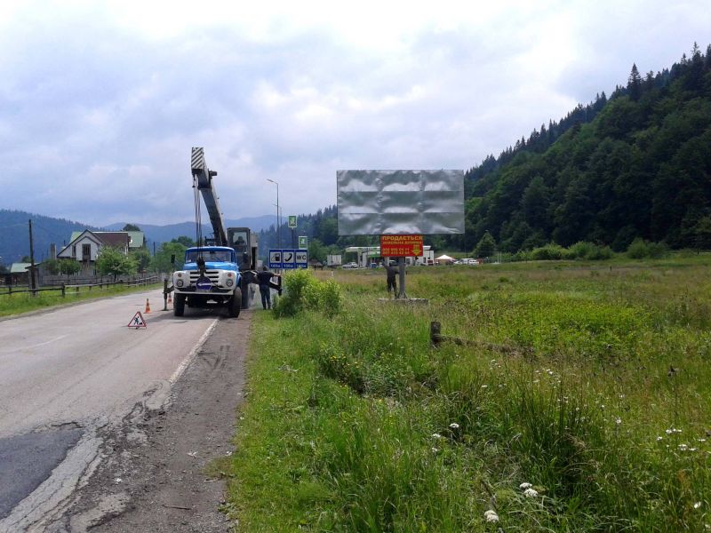 Білборд/Щит, Татаров, Траса Н-09 Мукачево-Львів, вїзд у село, 100 м перед АЗС ОККО, напрямок руху на Буковель