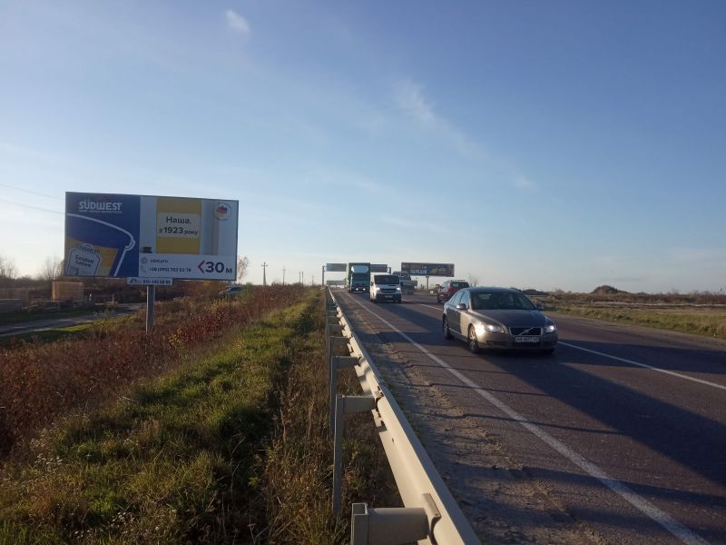 Билборд/Щит, Трассы, М-10 Західний обхід м. Львова, км. 14+350, праворуч, навпроти складу ВОЛПЕКС, рух в наплямку Готелю Панська Гора