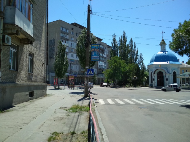 Холдер/Флаг, Бердянск, Праці пр. (навпроти часовні (перехрестя))