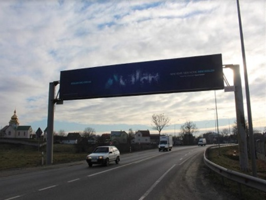 Арка/Реклама на мостах, Траси, Траса М-06, Київ - Чоп, 549 км, 500 м, в'їзд в місто
