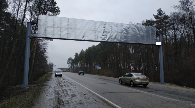 Арка/Реклама на мостах, Трассы, Траса М-10, Західний обхід, с. Підрясне, в сторону ТзОВ Фуджікура Україна