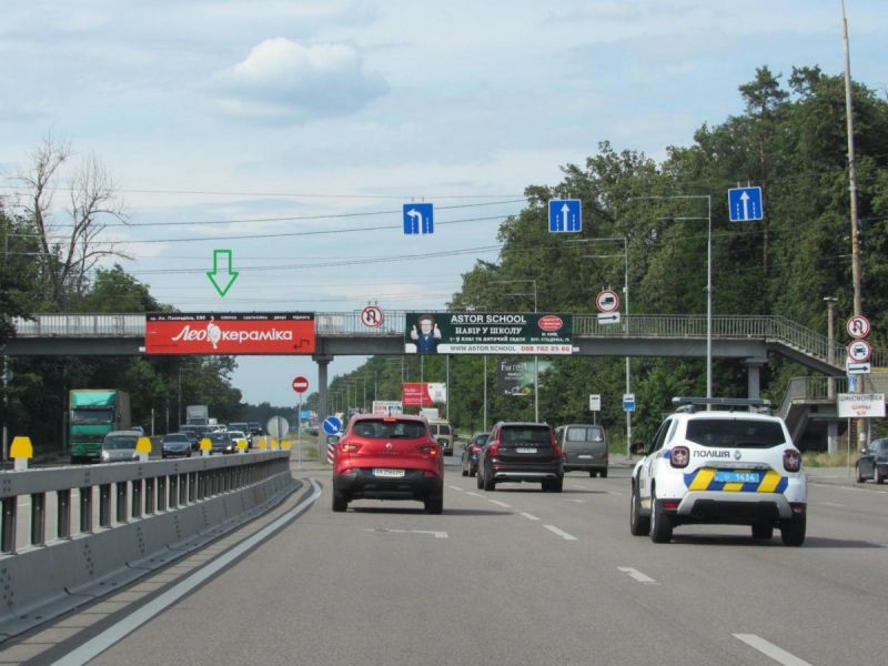 Реклама на мостах, Киев, пр. Академіка Палладіна, заїзд до ТРЦ Lavina Mall,Ашан, АЗС WOG, в напрямку Пуща-Водиці (ліва сторона)