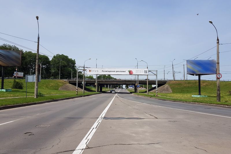 Арка/Реклама на мостах, Хмельницький, розв'язка вул.Кам'янецька - вул.Князя С.Хороброго - Львівське шосе. (зі сторони нового мосту) (від центру, на ринки)